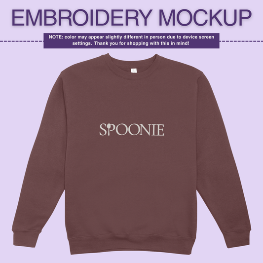 Dark maroon/brown sweatshirt with 'SPOONIE' embroidery design on a light purple background