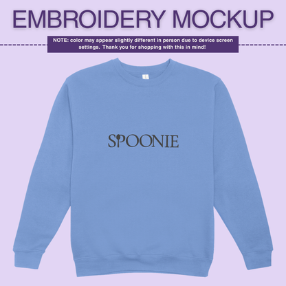 Soft blue sweatshirt with 'SPOONIE' embroidery design on a light purple background
