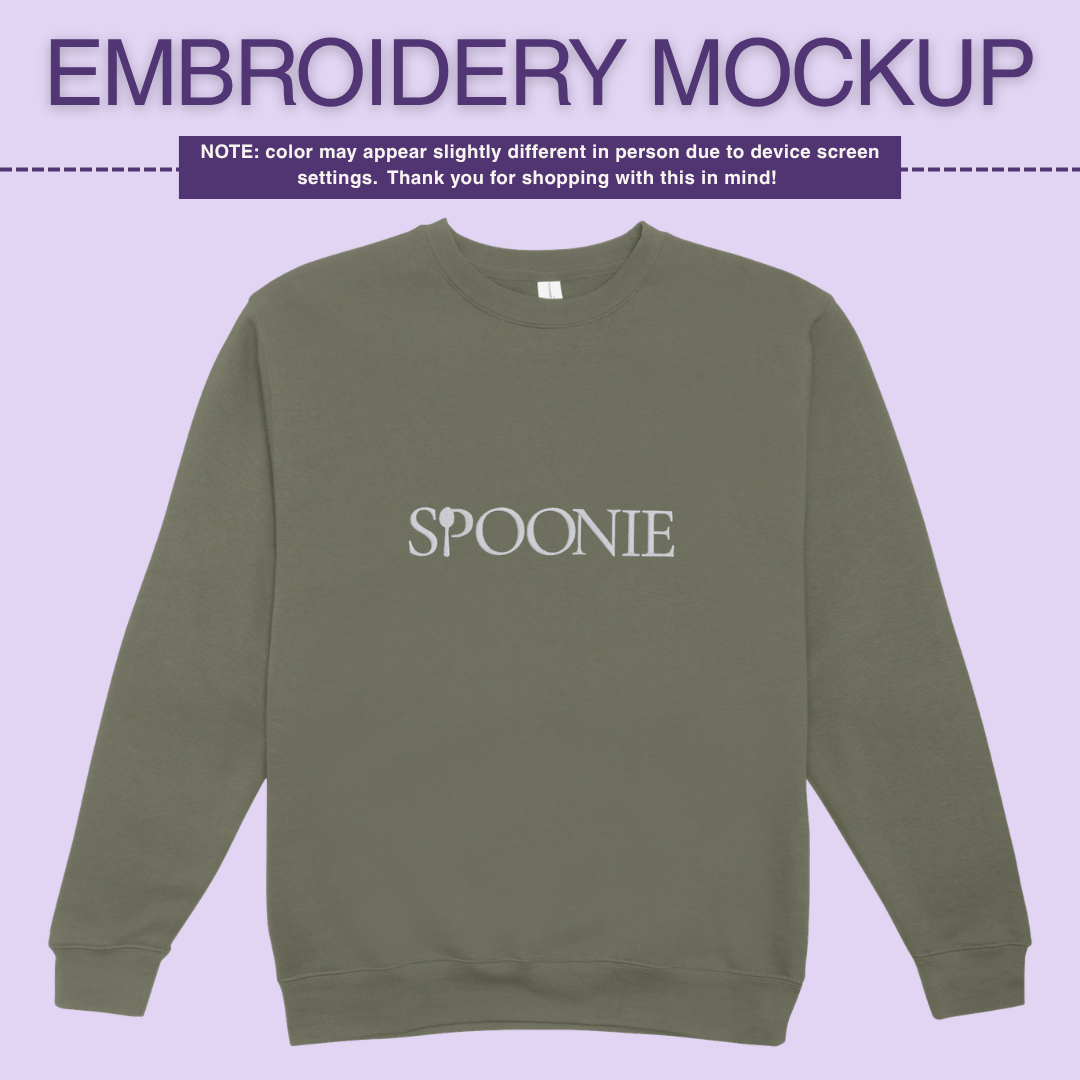 Olive green sweatshirt with 'SPOONIE' embroidery design on a light purple background