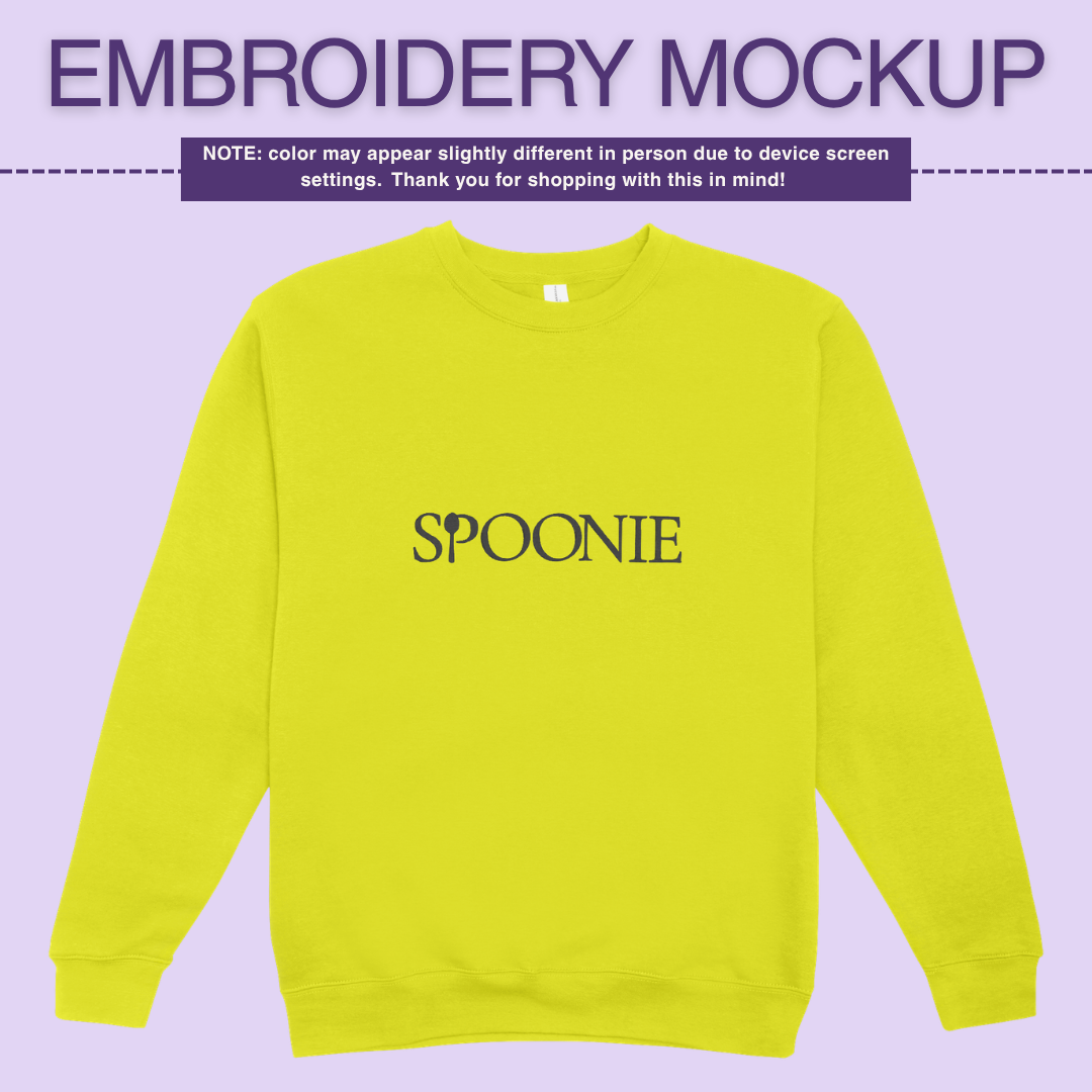Flourescent yellow sweatshirt with 'SPOONIE' embroidery design on a purple background
